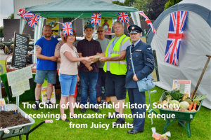 ray-recieving-chq-from-juicy-fruits.png - Wednesfield Lancaster Memorial
