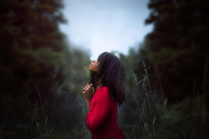 diana-simumpande-woman-wearing-red-sweatshirt-looking-at-top-between-trees-near-grass-during-daytime.jpg - That Dress! 