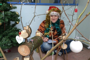 client-and-finished-reindeers-good-photo.jpg - Recycled wood workshop for young homeles