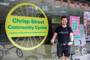 chrisp-street-community-cycles-logo-with-man.jpeg - Phase Two Chrisp Street Community Cycles