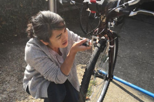 woman-fixing.jpg - Deptford Community Cycle Workshop