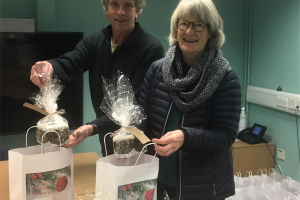 opcc-xmas-cake-donation-for-xmas-goodie-bags.jpg - Cotswold Friends Independent Living 