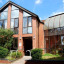 tp-the-place-exterior-sunny.jpg