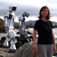 dall-e-2024-01-28-17-08-11-brave-new-world-workers-by-the-sea-with-robots.jpeg