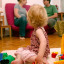 girl-on-floor-with-2-adults.jpg