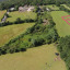 aerialshotfarmsummer-with-field.jpg