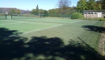 Resurfacing local tennis courts